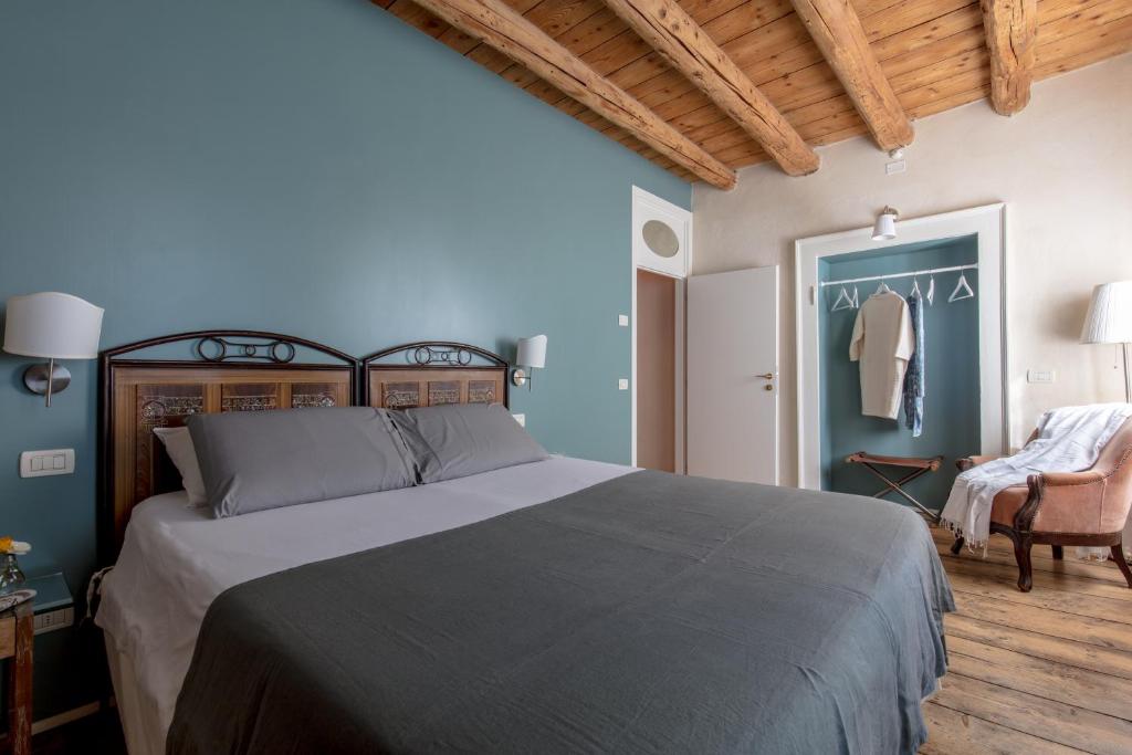 Cama o camas de una habitación en CasaBiondani Lazise