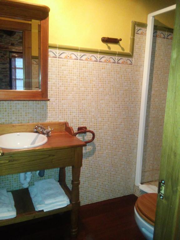 Koupelna v ubytování Casa Colason