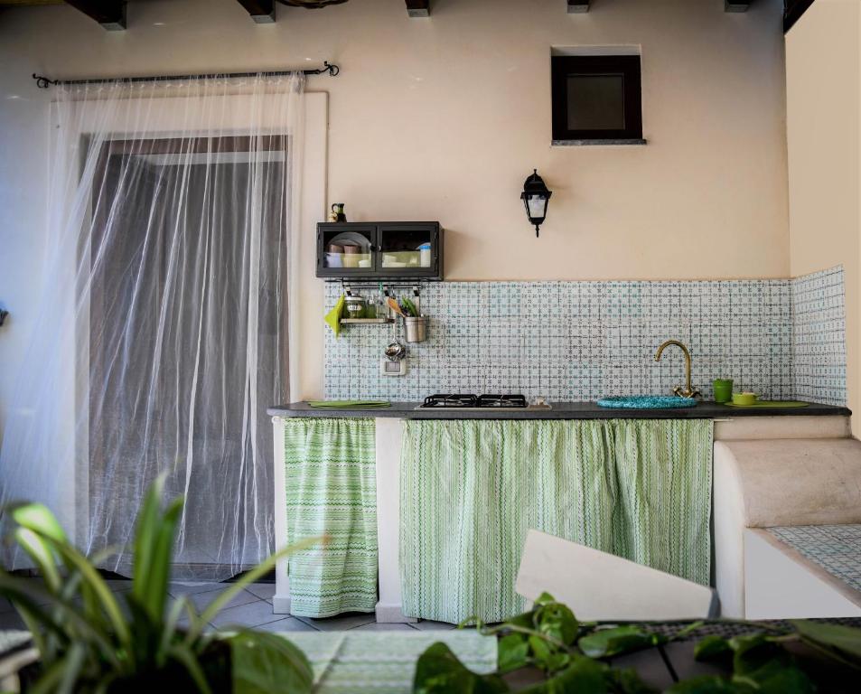 A kitchen or kitchenette at Venti di Mare