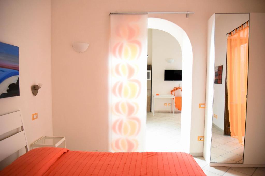A bed or beds in a room at Venti di Mare