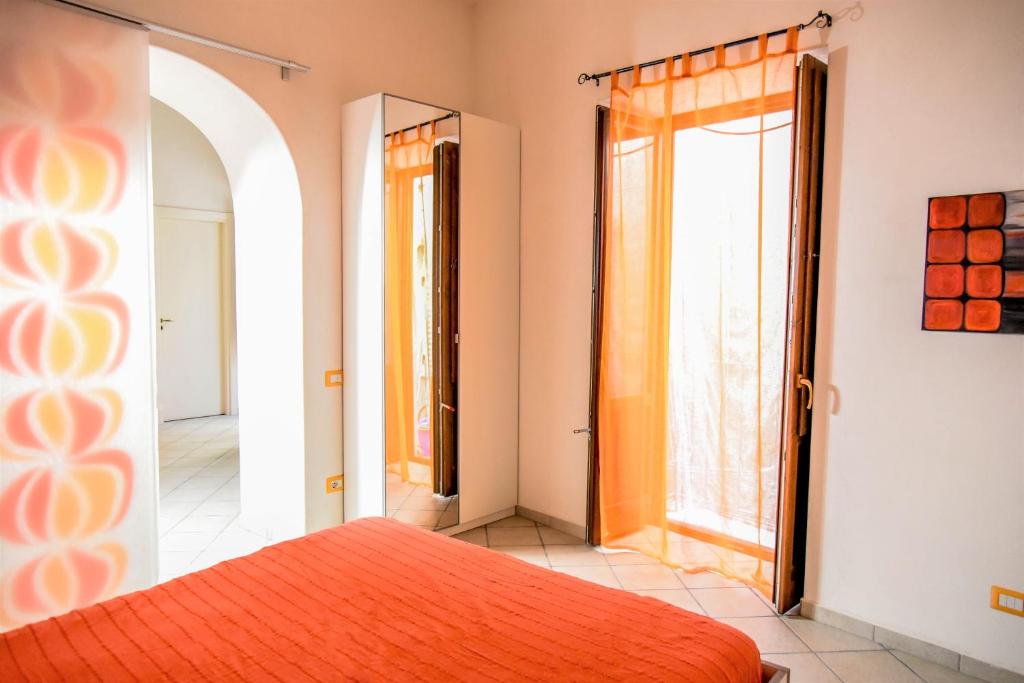 A bed or beds in a room at Venti di Mare