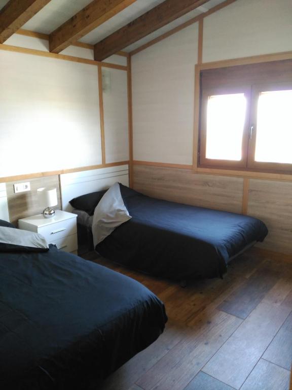 Postel nebo postele na pokoji v ubytování Bungalows Cantia
