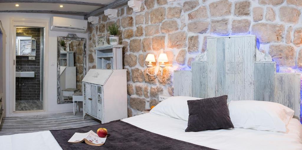 Een bed of bedden in een kamer bij Guesthouse Rustico