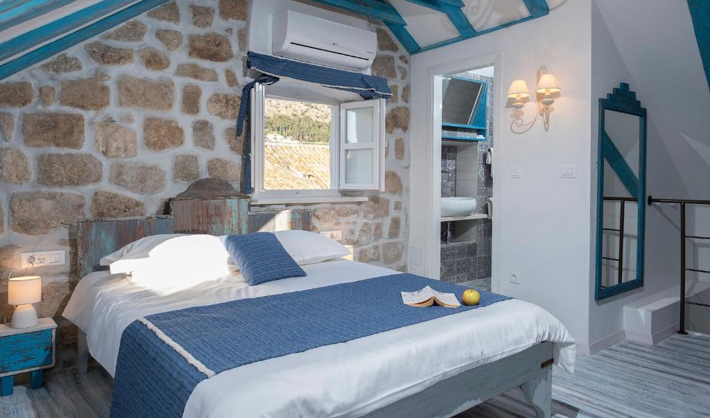 Een bed of bedden in een kamer bij Guesthouse Rustico