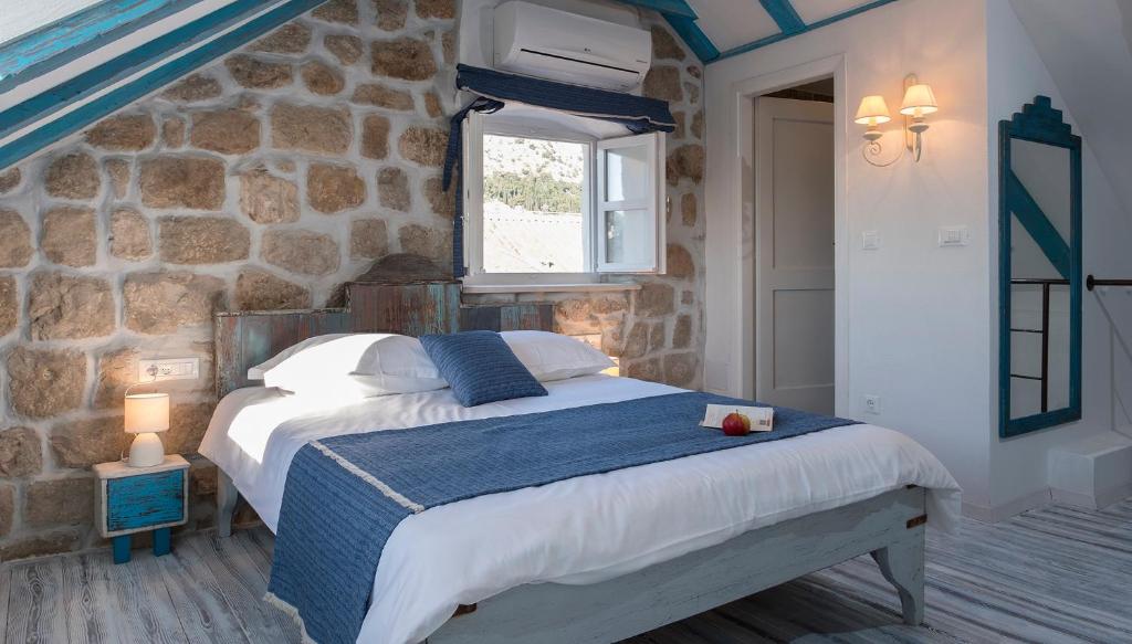 Een bed of bedden in een kamer bij Guesthouse Rustico
