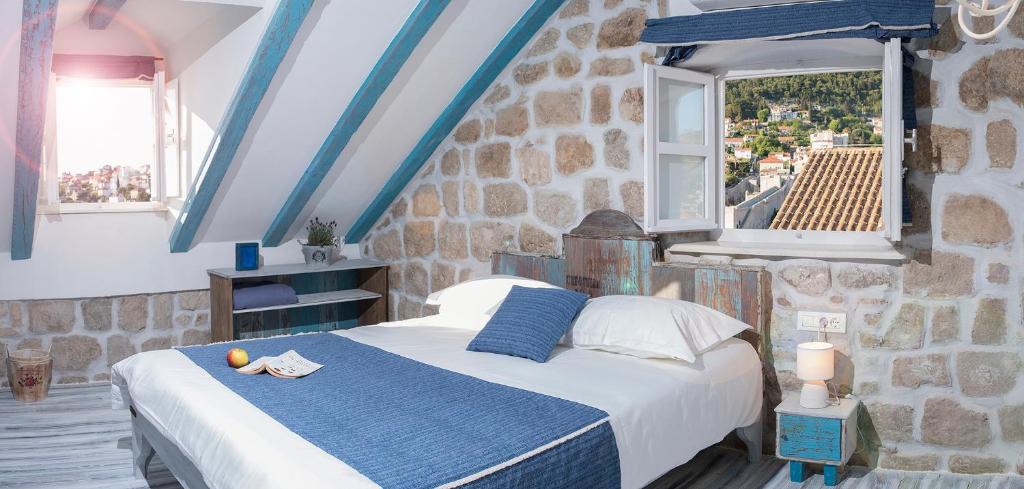 Een bed of bedden in een kamer bij Guesthouse Rustico