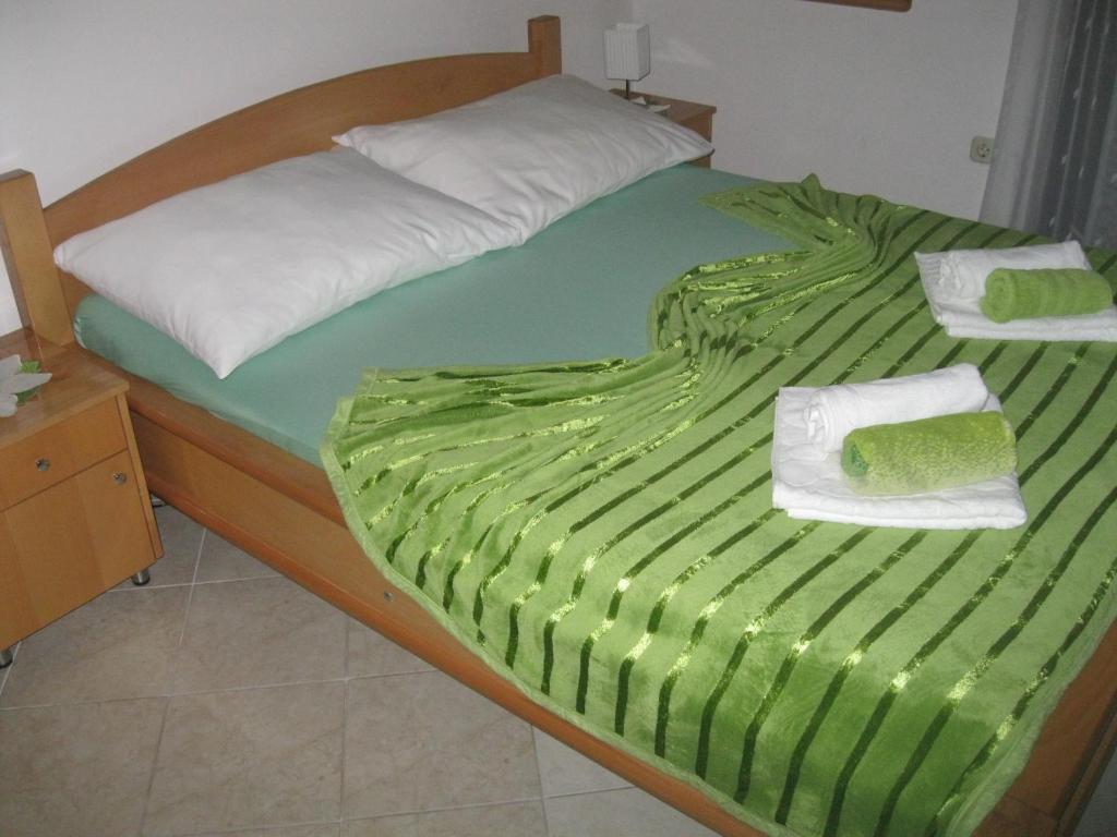 Posteľ alebo postele v izbe v ubytovaní Apartments Villa Macola