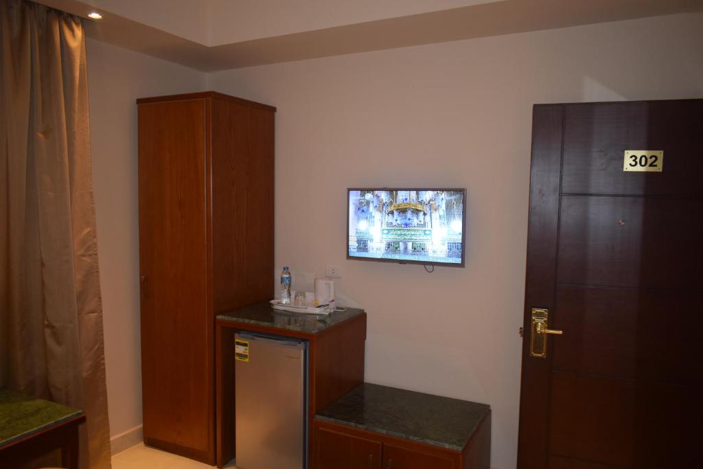 TV a/nebo společenská místnost v ubytování Omar El Khayam Al Minya Hotel