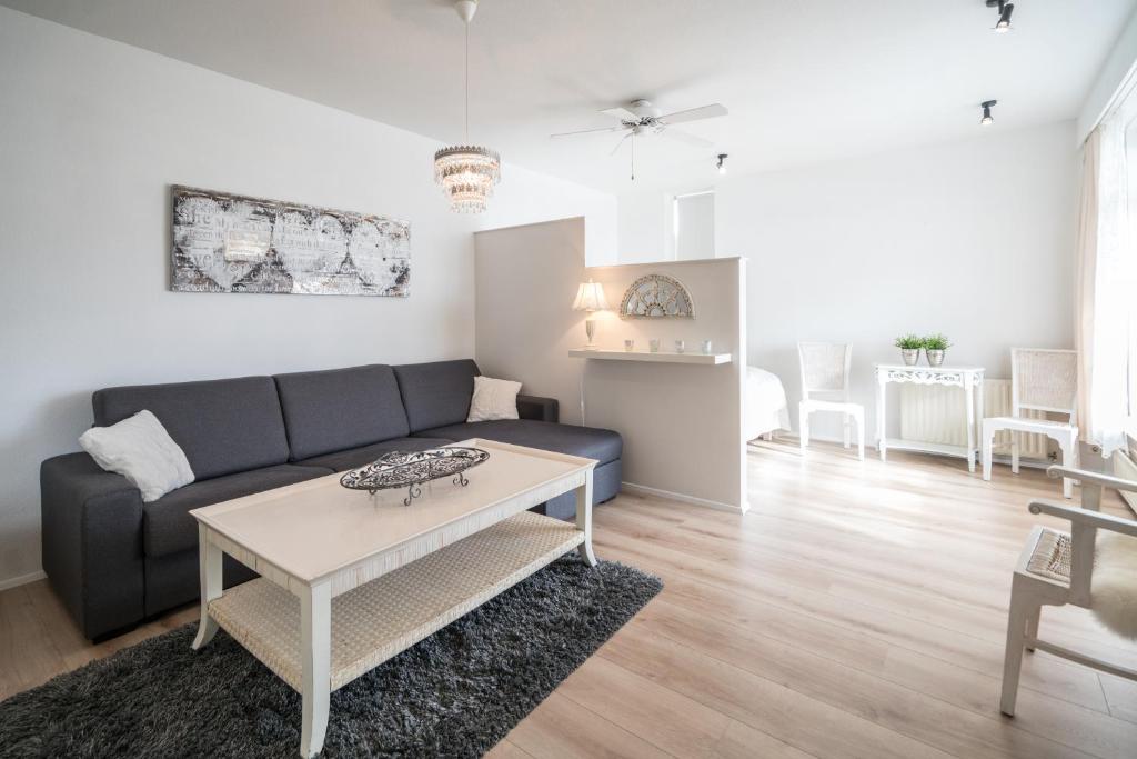 Posezení v ubytování River Apartments