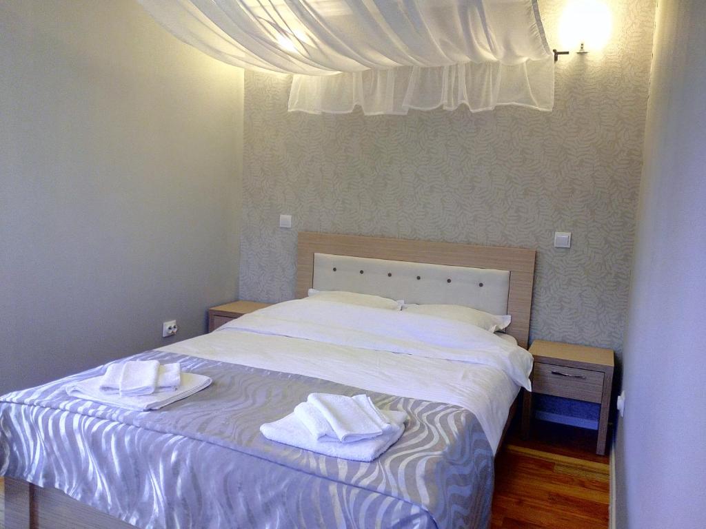 Postel nebo postele na pokoji v ubytování Vila Slanic