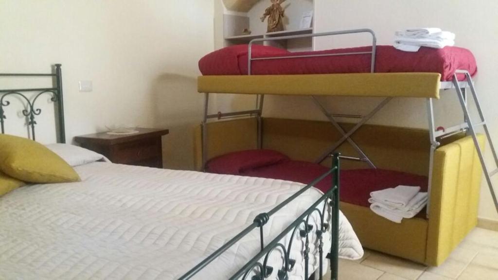 Postel nebo postele na pokoji v ubytování B&B San Potito