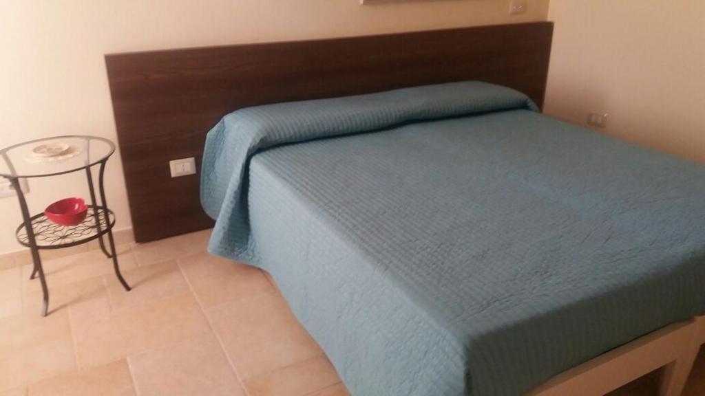 Postel nebo postele na pokoji v ubytování B&B San Potito