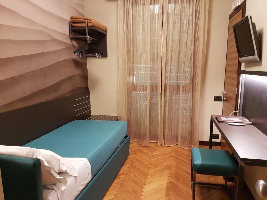 TV a/nebo společenská místnost v ubytování Park Hotel Meublé