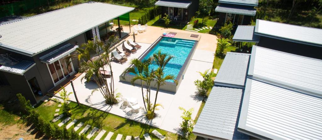 an aerial view of a house with a swimming pool at The Herbal Khao Lak in Khao Lak
