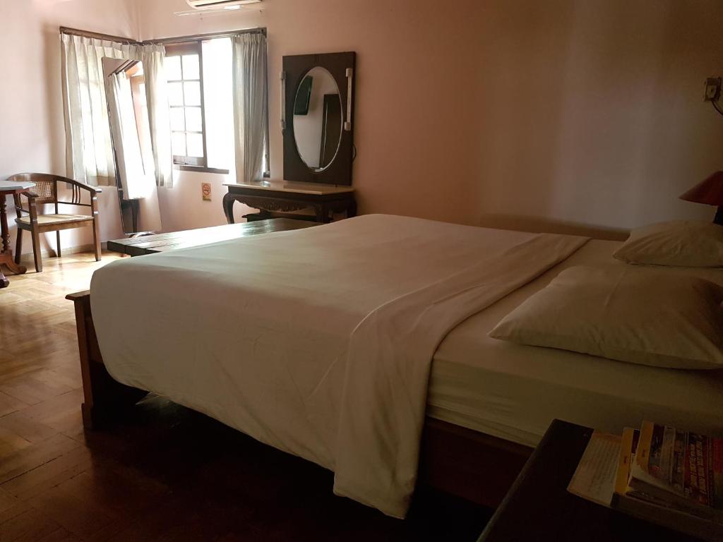 Postel nebo postele na pokoji v ubytování Peye Guesthouse