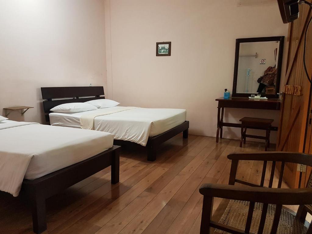 Postel nebo postele na pokoji v ubytování Peye Guesthouse