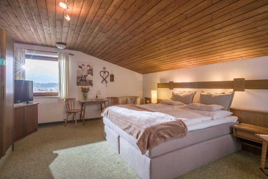 Postel nebo postele na pokoji v ubytování Haus Central