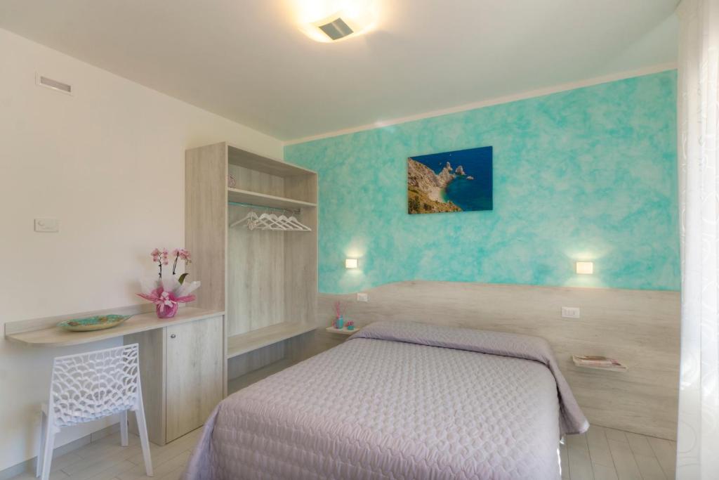 Posteľ alebo postele v izbe v ubytovaní Affittacamere I Principi del Conero CIR 00041
