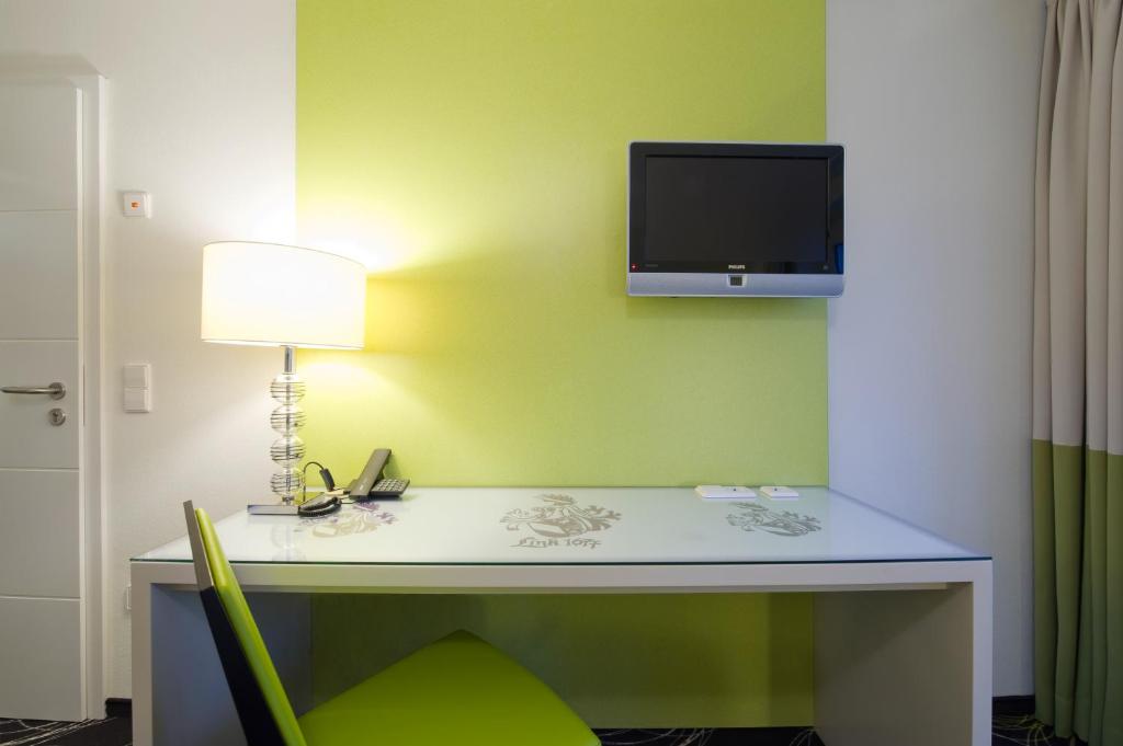 TV a/nebo společenská místnost v ubytování Hotel Landgasthof Bären