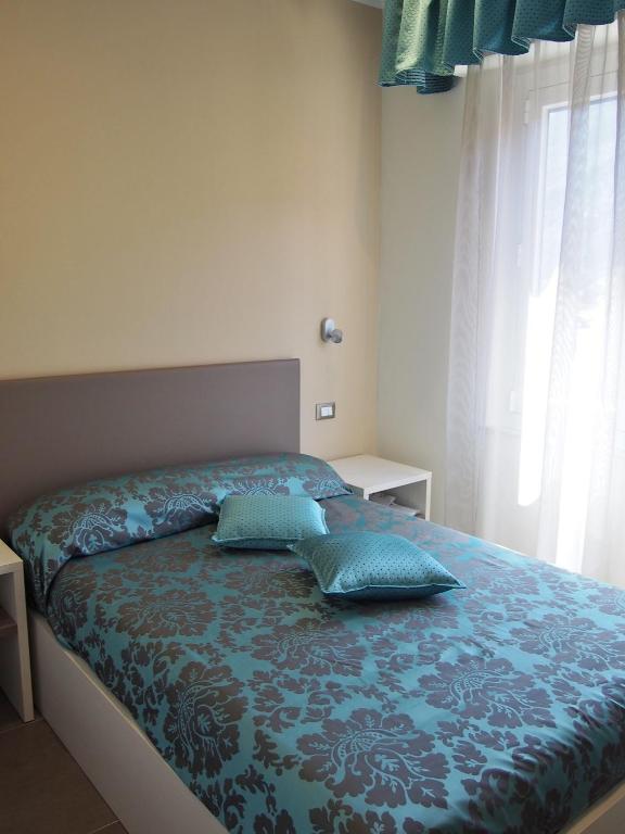 Postel nebo postele na pokoji v ubytování Endro's Rooms