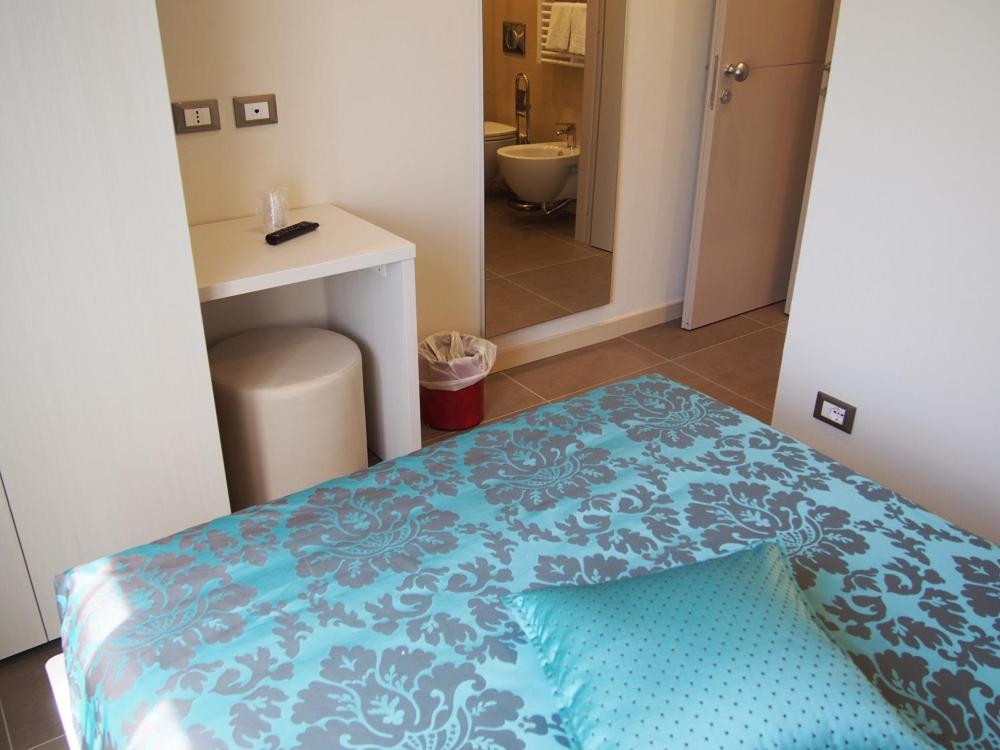 Postel nebo postele na pokoji v ubytování Endro's Rooms