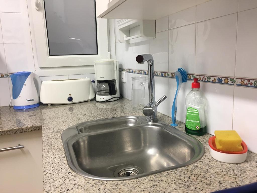 Kuchyň nebo kuchyňský kout v ubytování Apartament Antic Plankton - Calella Palafrugell - Free Parking, Beach, Wifi, Perfect holidays