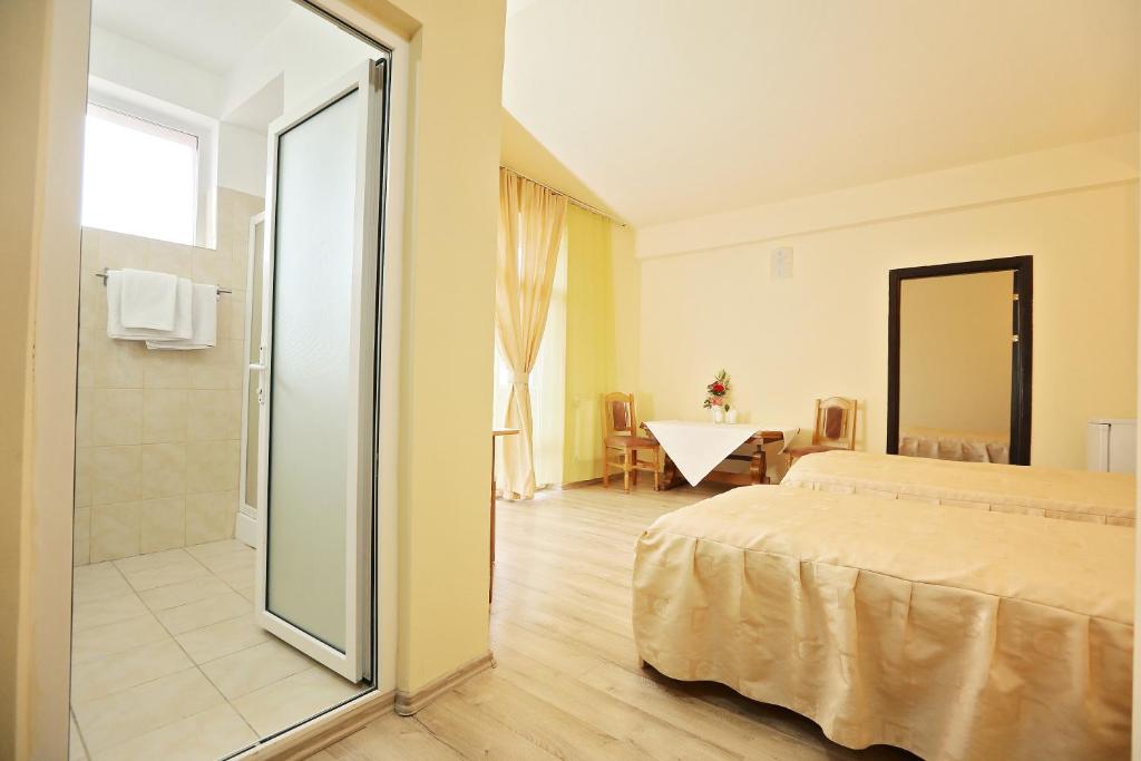 Postel nebo postele na pokoji v ubytování Hotel Class
