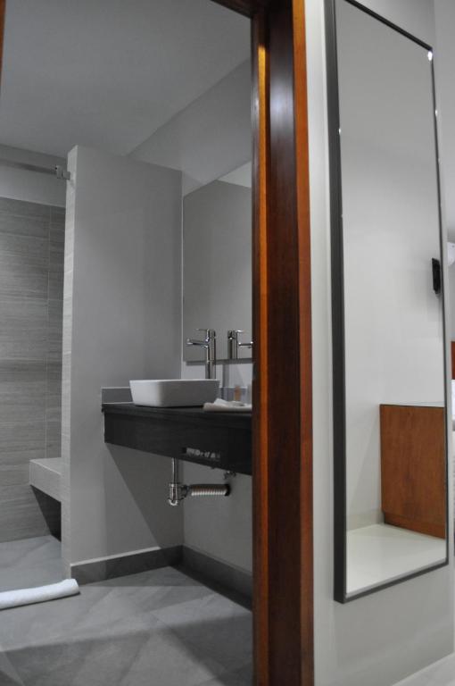 Koupelna v ubytování AMD Hotel