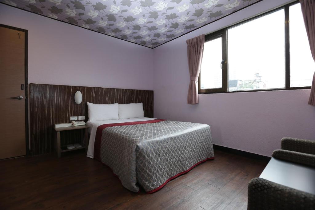 Postel nebo postele na pokoji v ubytování Sofu Hotel