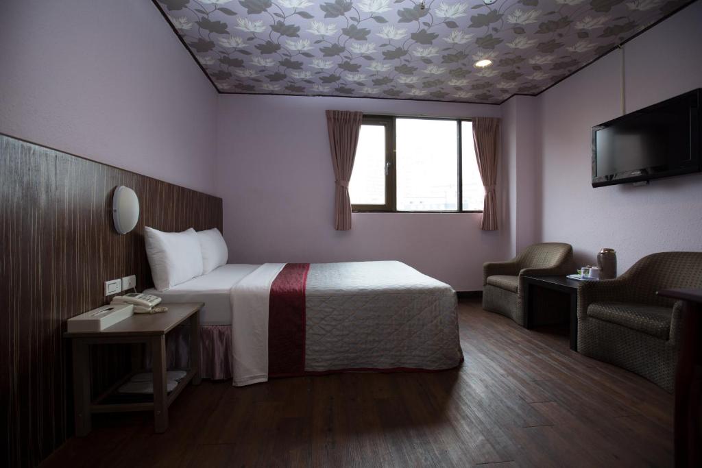 Postel nebo postele na pokoji v ubytování Sofu Hotel