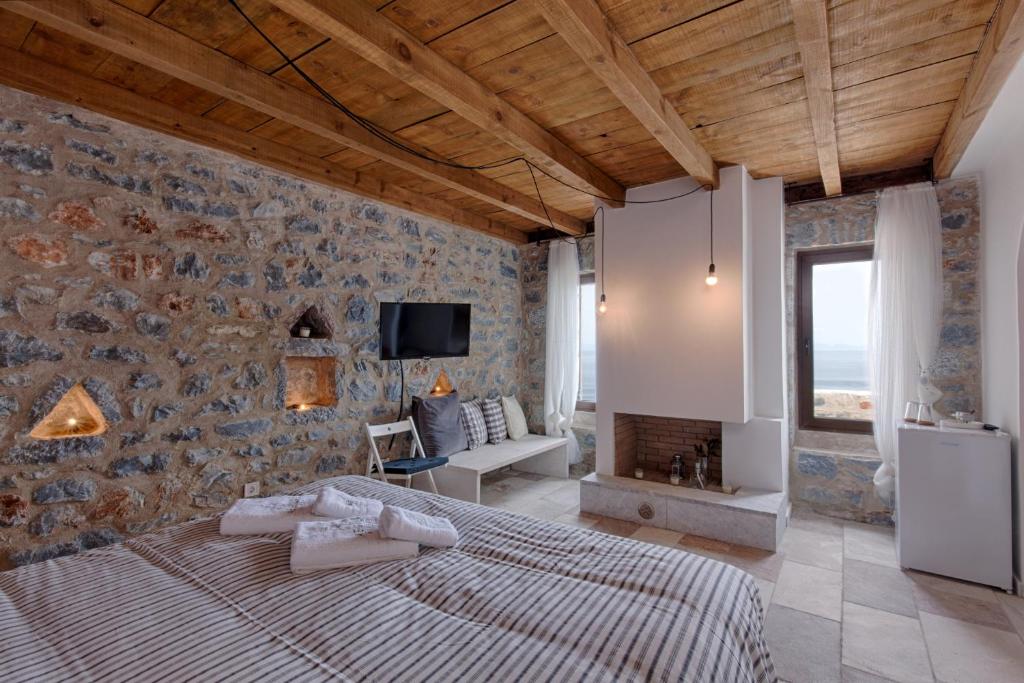 Postel nebo postele na pokoji v ubytování Aegila Boutique Hotel