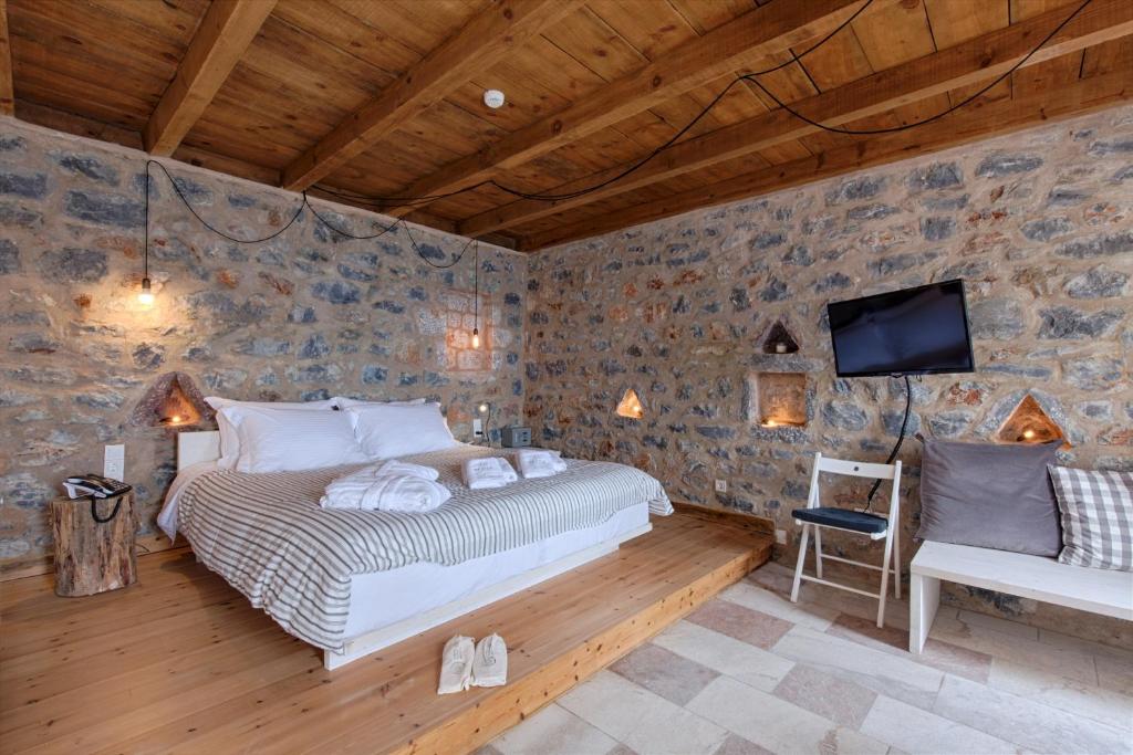 Postel nebo postele na pokoji v ubytování Aegila Boutique Hotel