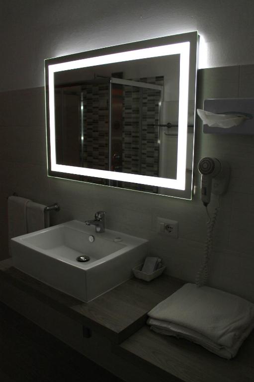 Koupelna v ubytování Albergo Paradiso