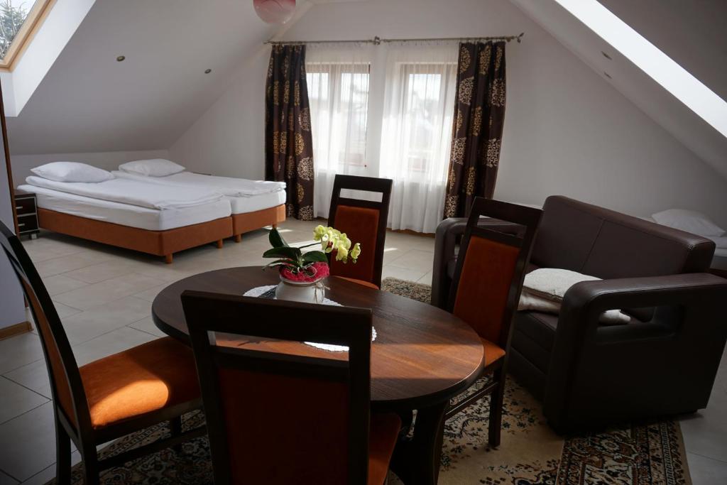 Postel nebo postele na pokoji v ubytování Gościniec Klejnot