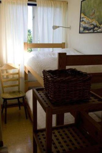 Postel nebo postele na pokoji v ubytování Segerstads Fyr