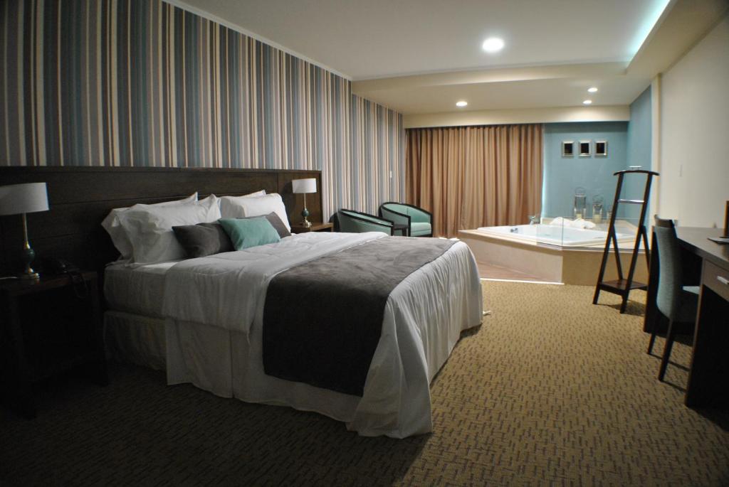 Postel nebo postele na pokoji v ubytování Mayim Hotel Termal & Spa