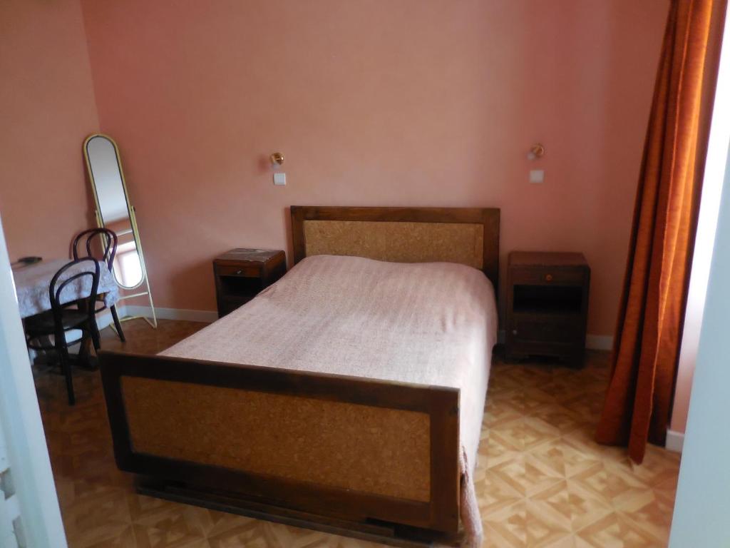 Postel nebo postele na pokoji v ubytování Hotel Magne