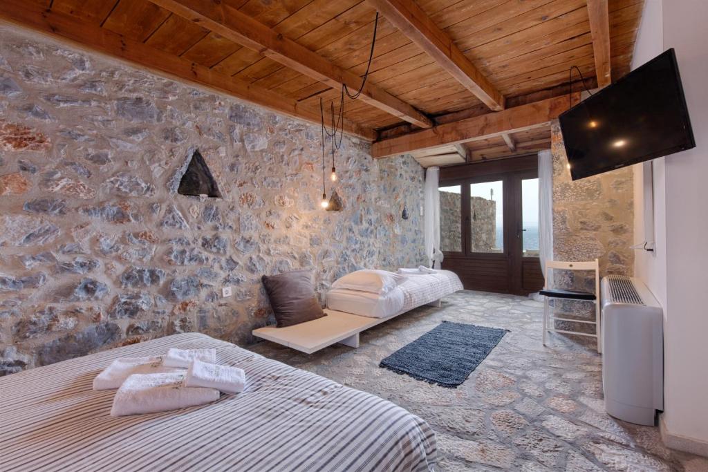 Postel nebo postele na pokoji v ubytování Aegila Boutique Hotel