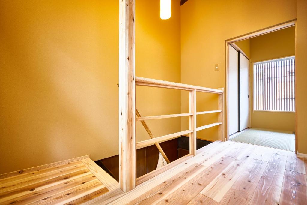 a room with a bunk bed in the corner at Mibuan in Kyoto