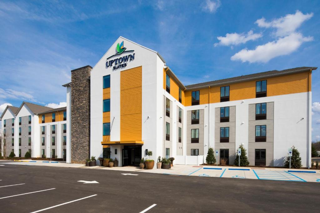 a rendering of the front of a hotel at Uptown Suites Extended Stay Charlotte NC - Concord in Concord