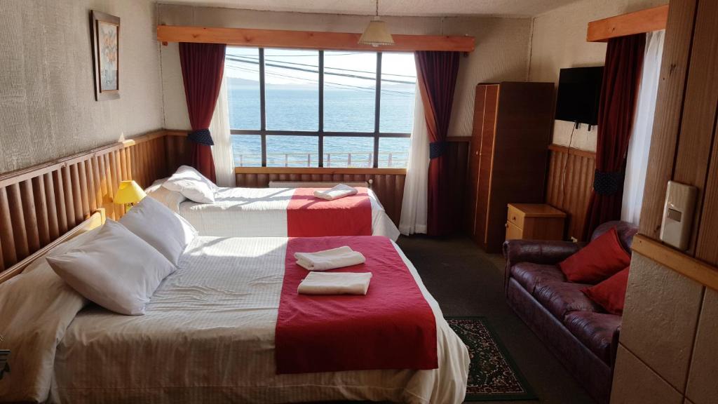 Postel nebo postele na pokoji v ubytování Hostal Vista al Mar hct