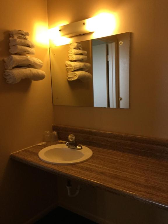 Koupelna v ubytování Deluxe Inn