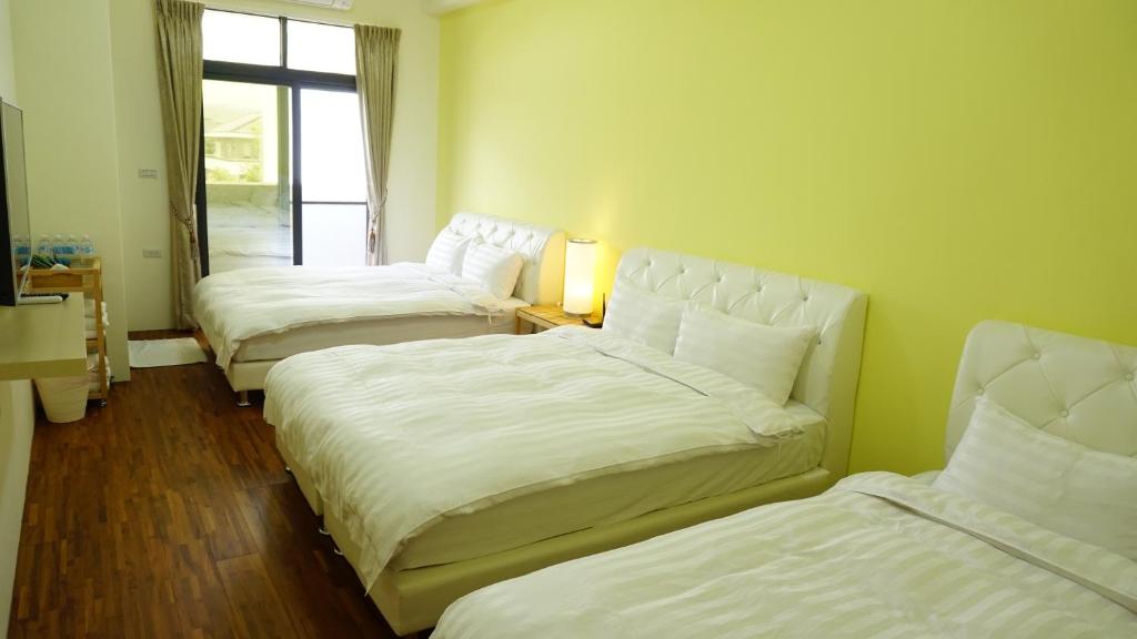 Postel nebo postele na pokoji v ubytování Warm Home