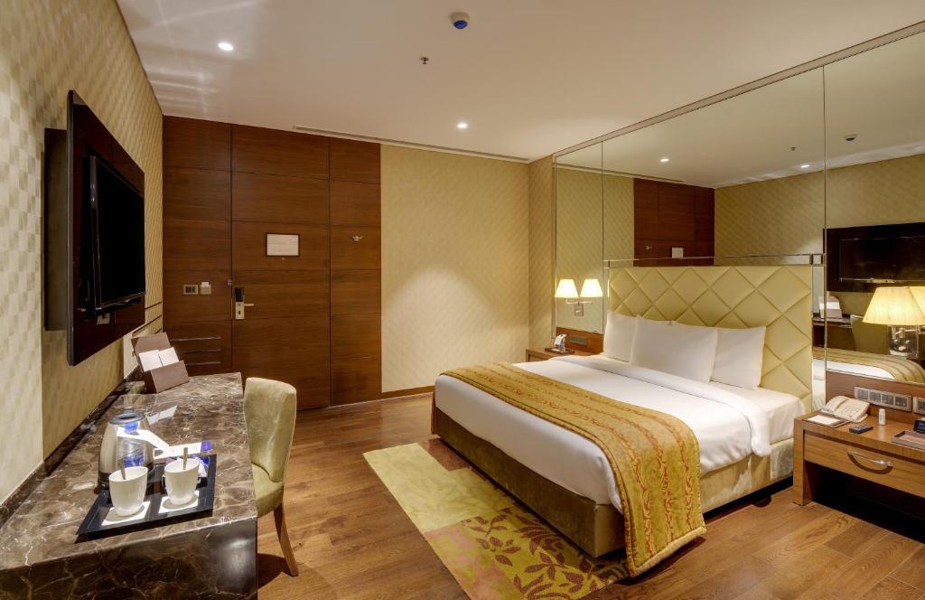 Uma cama ou camas num quarto em Niranta Transit Hotel Terminal 2 Arrivals/Landside