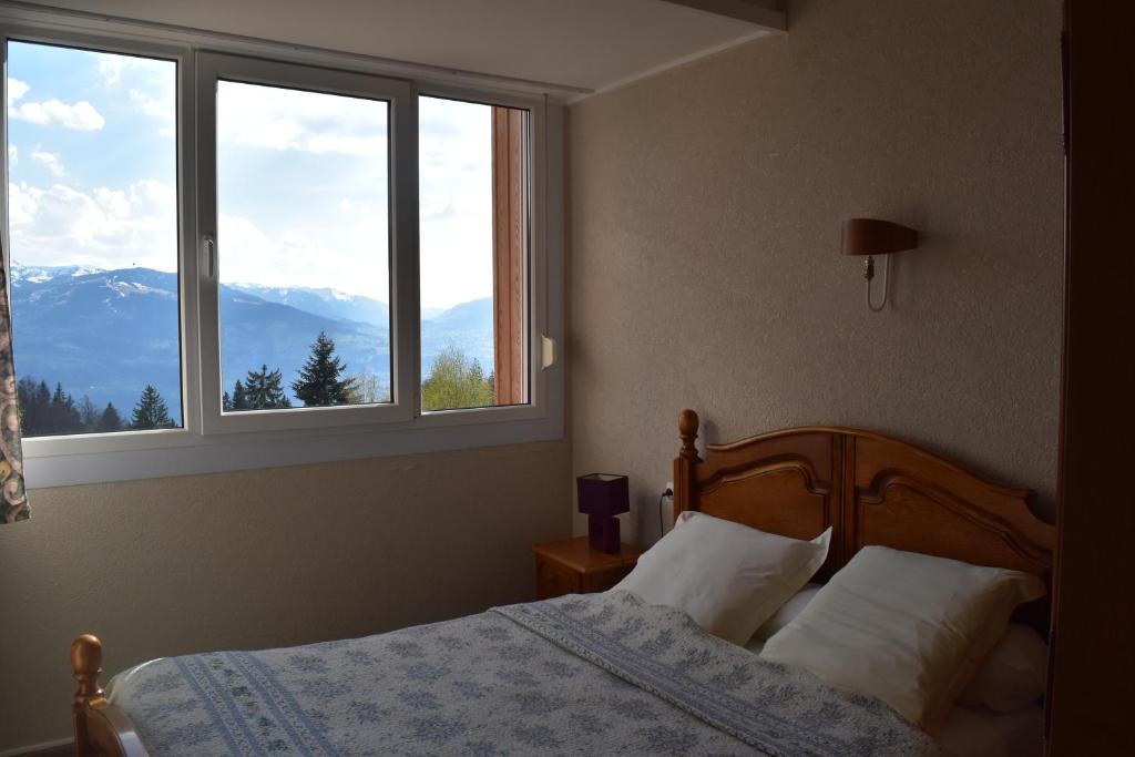 Letto o letti in una camera di Résidence Le Fontenay