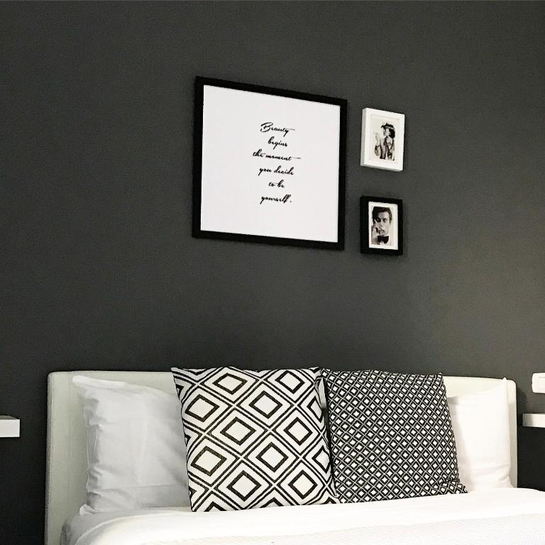 A bed or beds in a room at Serendipity