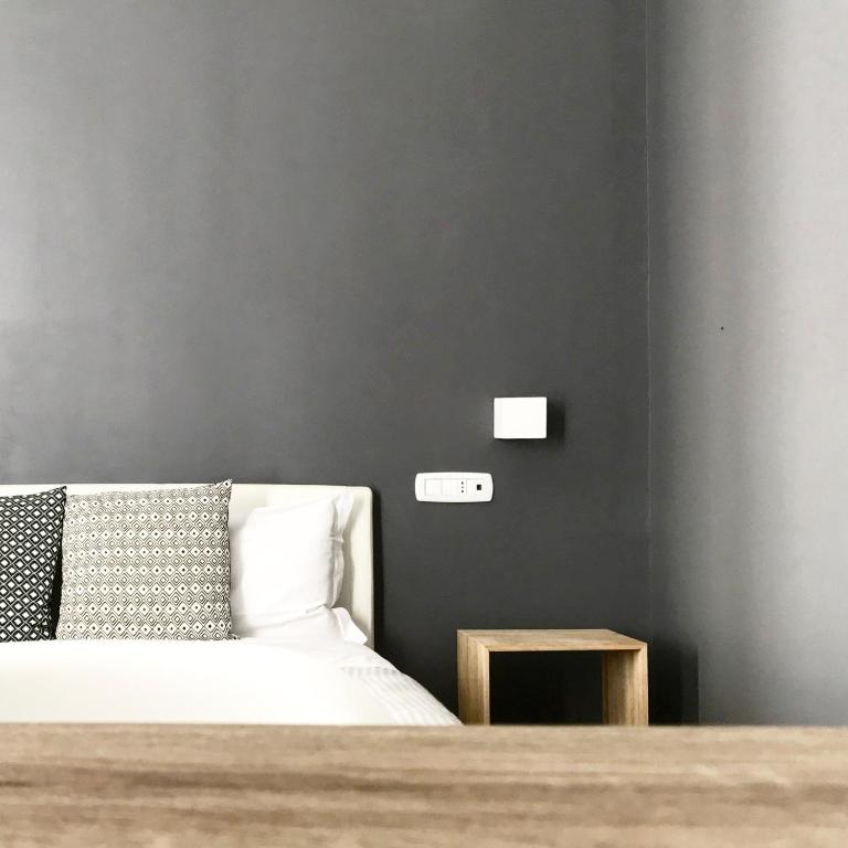 A bed or beds in a room at Serendipity