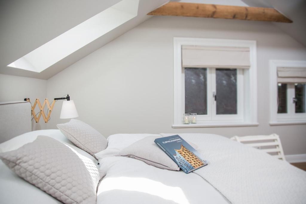 Postel nebo postele na pokoji v ubytování Das ELBCOTTAGE