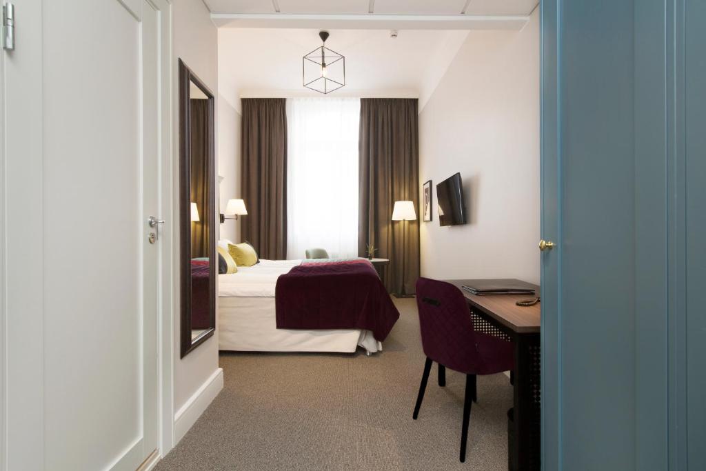 Postel nebo postele na pokoji v ubytování Elite Hotel Mimer