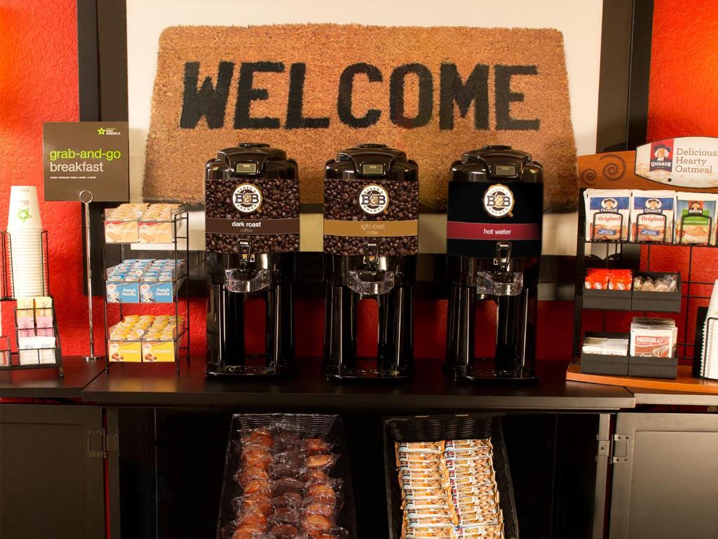 a store with a welcome sign on a counter at Southpoint Suites in Jacksonville